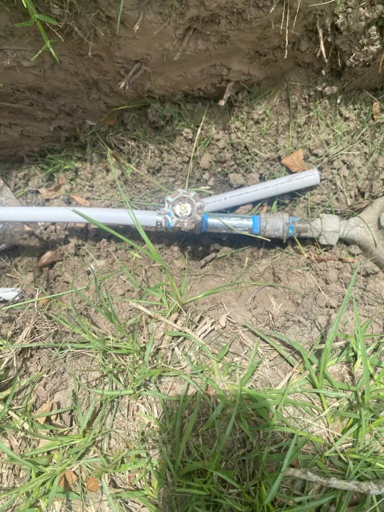 Close-up of a new water line and shutoff valve installed for a remodel project in Parks, Louisiana