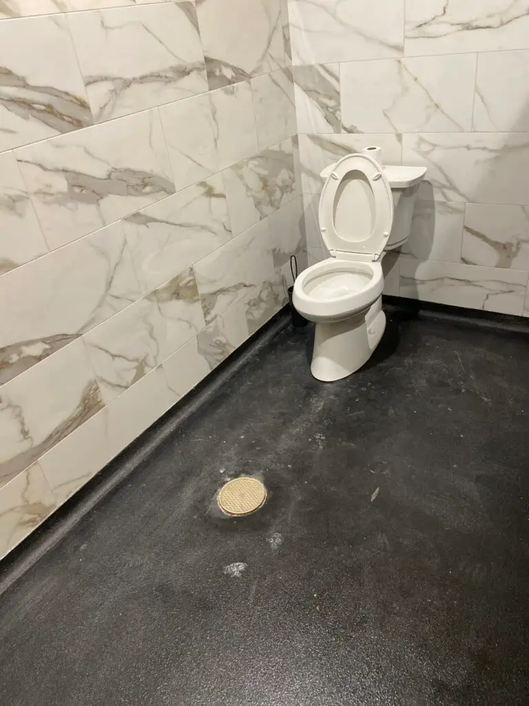 Commercial restaurant toilet installation at Bambino’s Burgers in New Iberia, Louisiana