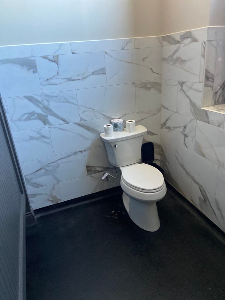 Completed commercial toilet replacement at Bambino’s Burgers restaurant in New Iberia, Louisiana