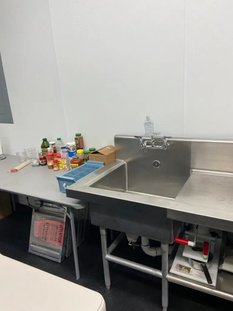 Commercial sink installation at Bambino’s Burgers restaurant in New Iberia, Louisiana