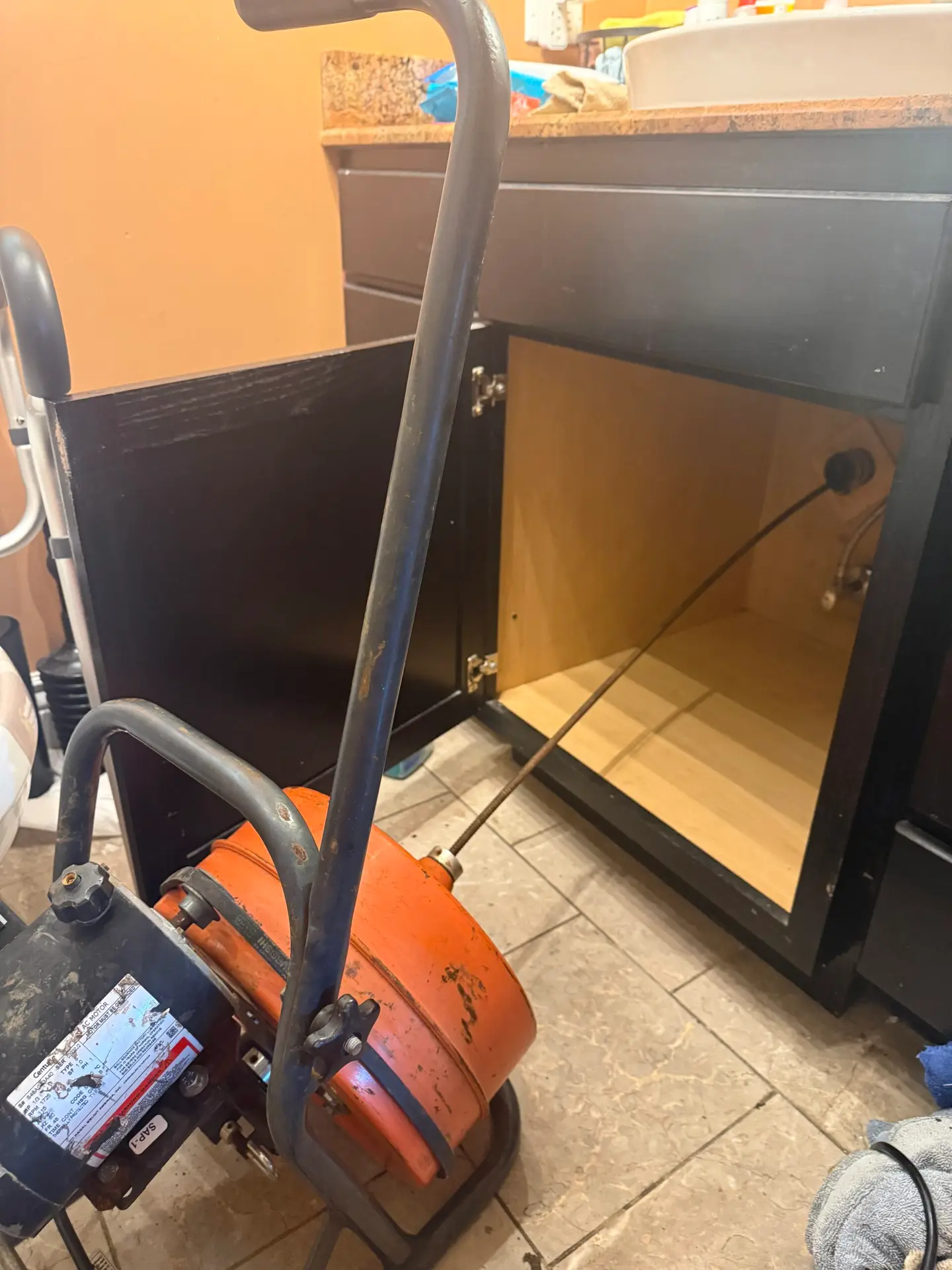 Bathroom sink drain cleaning with a cable machine in Franklin, Louisiana