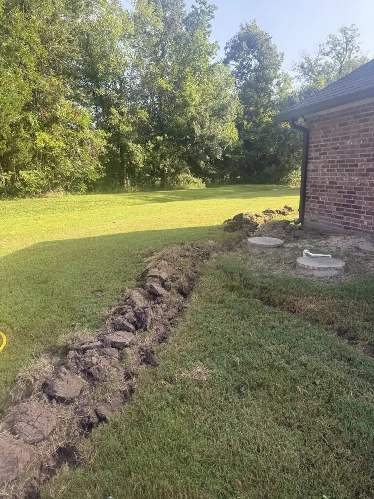 Residential trench prepared for an underground gas line replacement in Breaux Bridge, Louisiana
