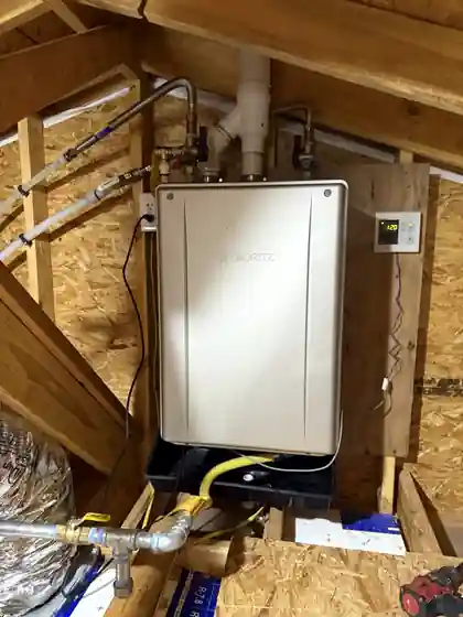 Noritz tankless water heater installation in an attic in New Iberia, Louisiana