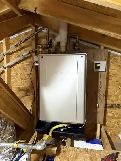Completed Noritz tankless water heater with water, gas and vent connections in New Iberia, Louisiana
